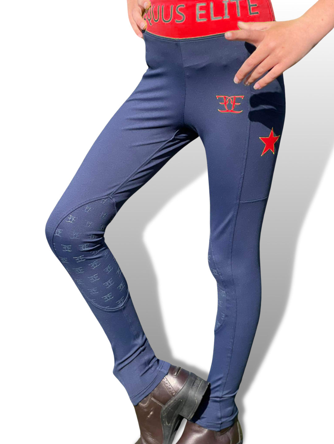 Navy blue Kids X Training Tights with red waistband and star logo details for active wear