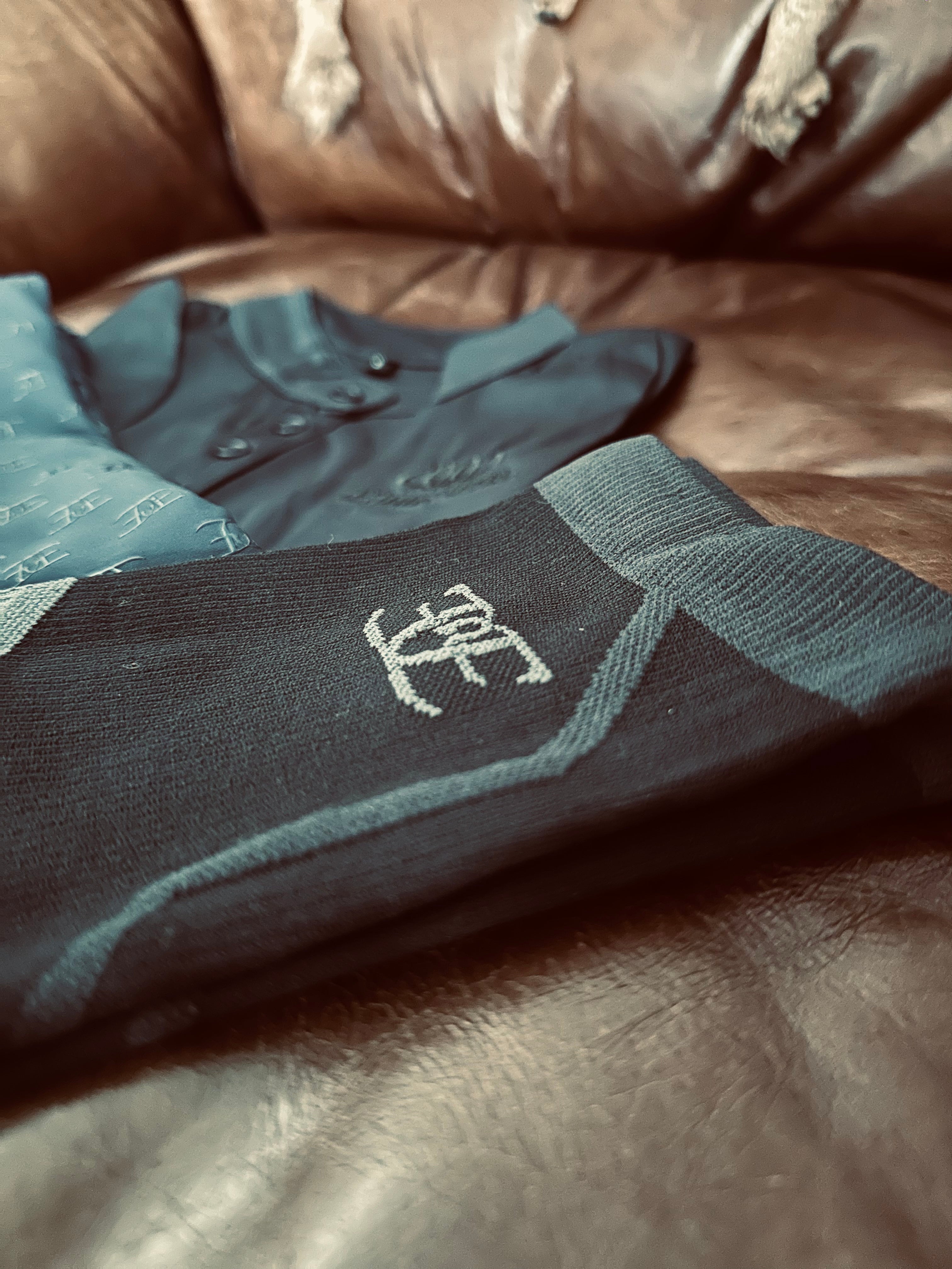 Teal and gray wetsuit with logo, perfect for sport compression and active riding tights