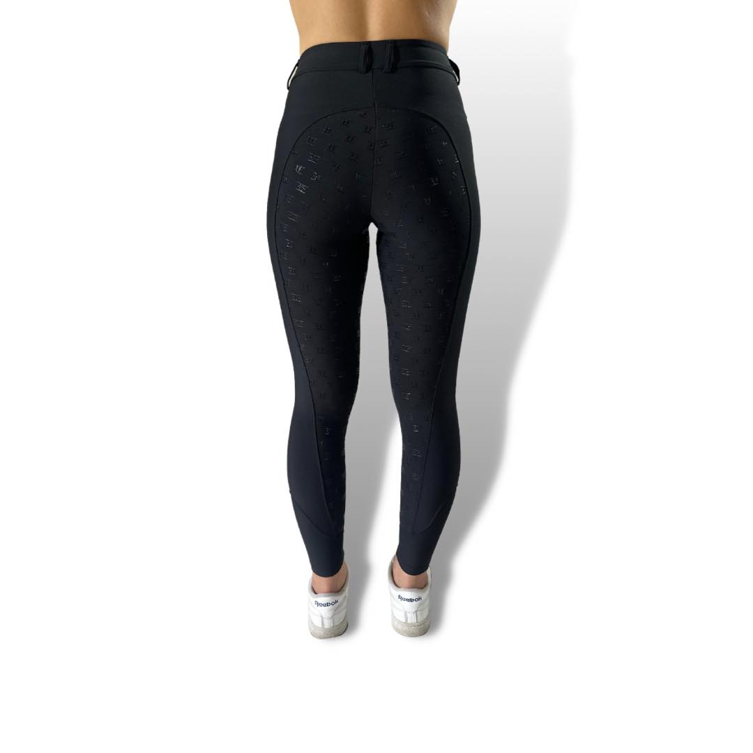 Black high-waisted leggings showcasing Staple Black Breeches riding tights on lower body