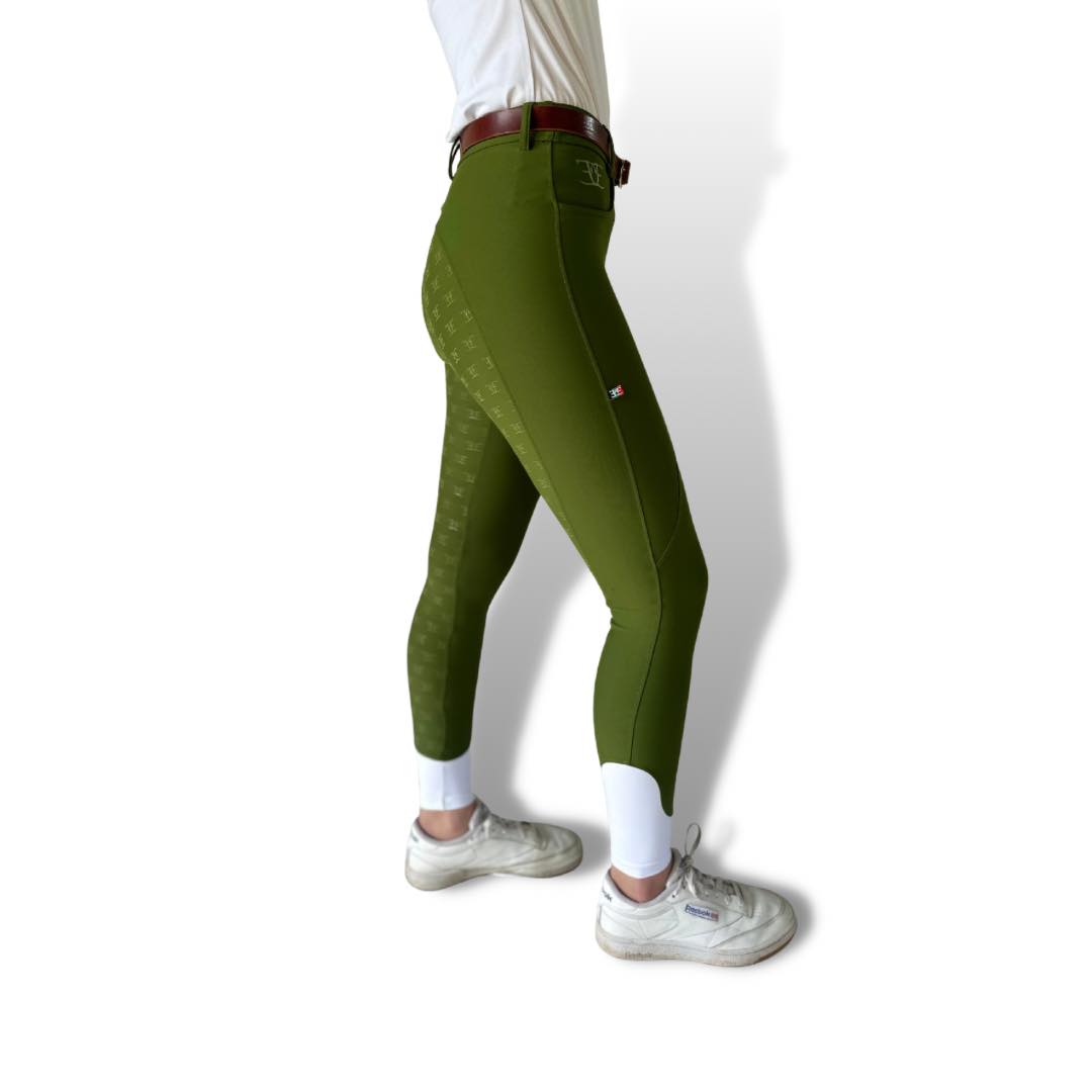 Classic Olive XT Breeches in olive green paired with white sneakers for a stylish look