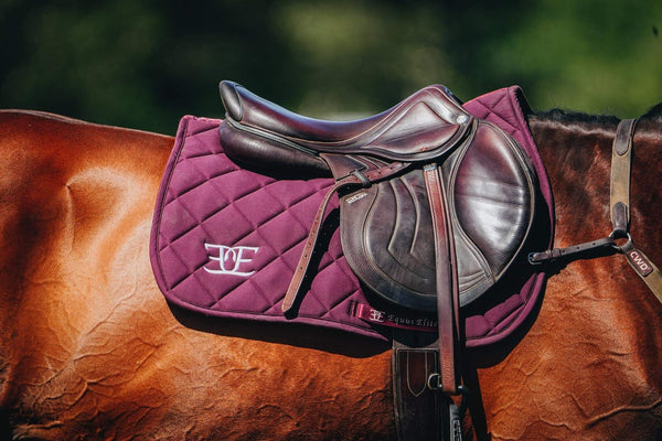 Burgundy and brown leather Equus Elite Saddle Pad with quilted padding for riding tights
