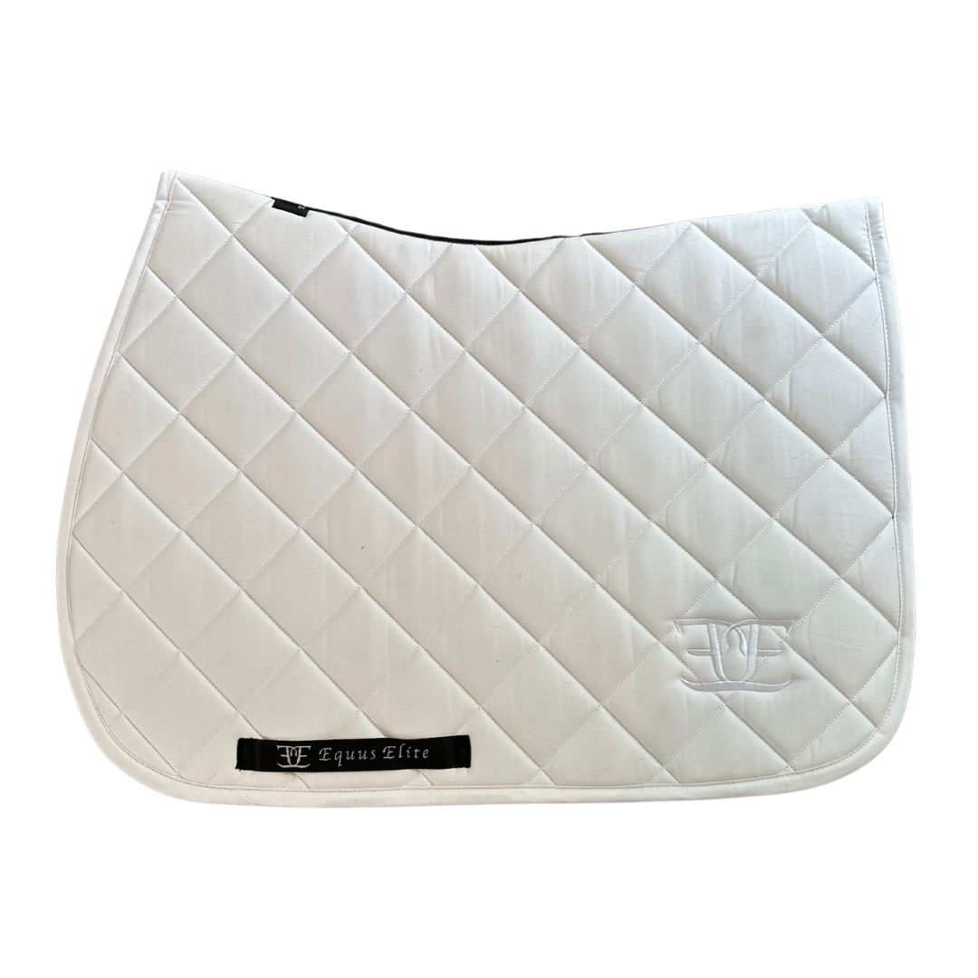 White quilted Equus Elite Saddle Pad with logo, perfect for breeches and riding tights