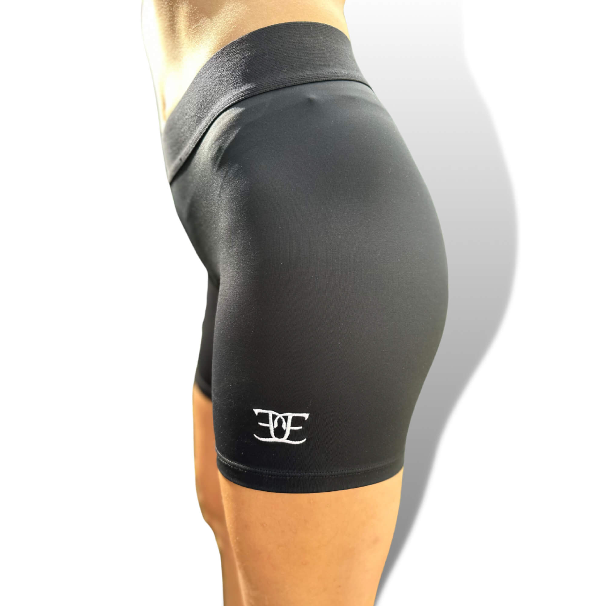 Black athletic shorts with logo, perfect for riding tights or breeches style