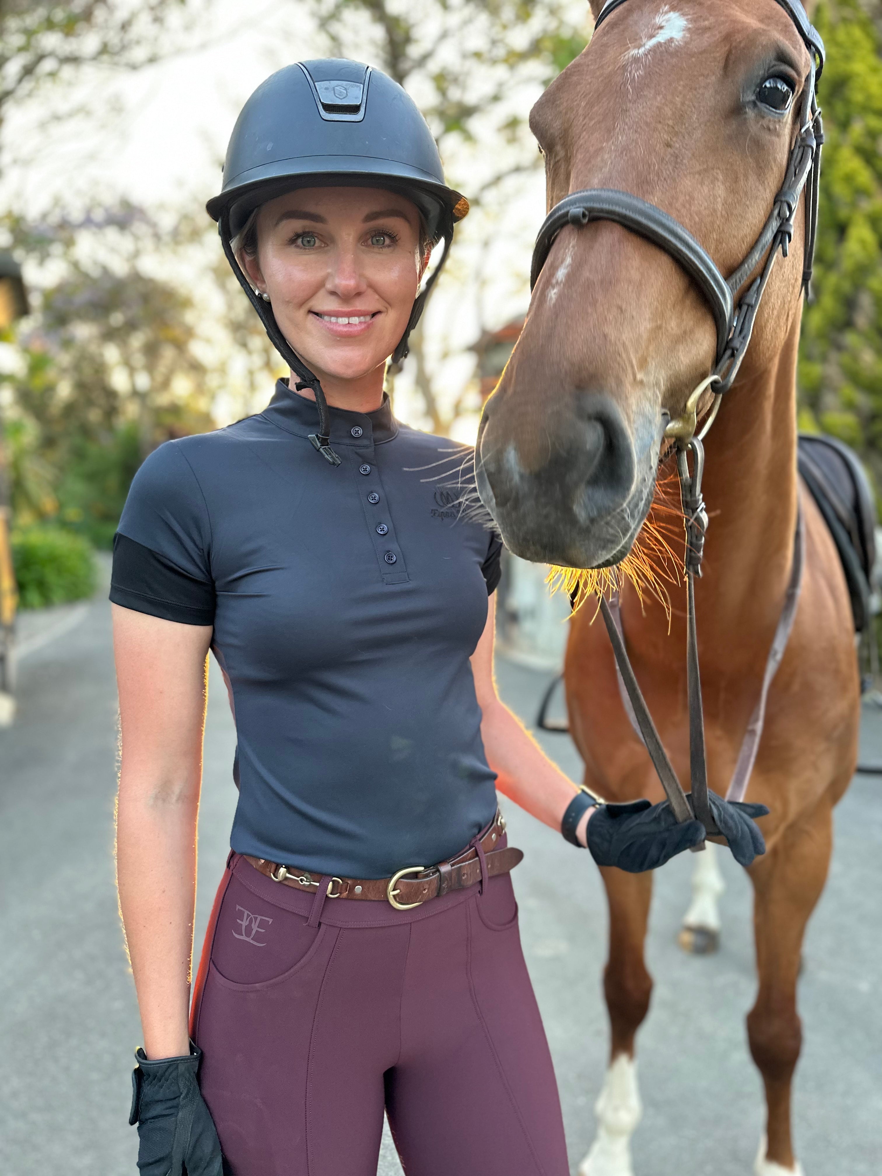 Horse beside rider in equestrian gear featuring a stylish Performance Show shirt